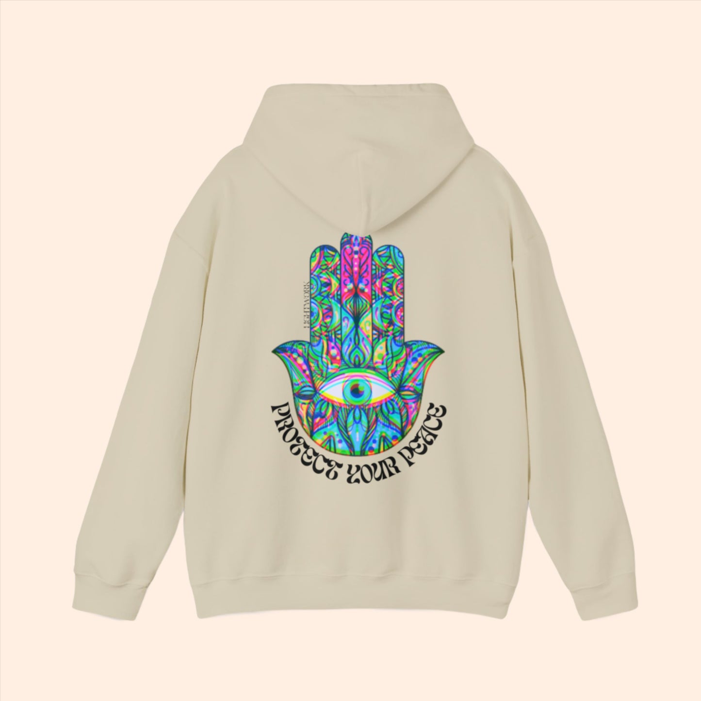 Beige spiritual hoodie. Psychedelic hamsa graphic with "protect your peace" text.