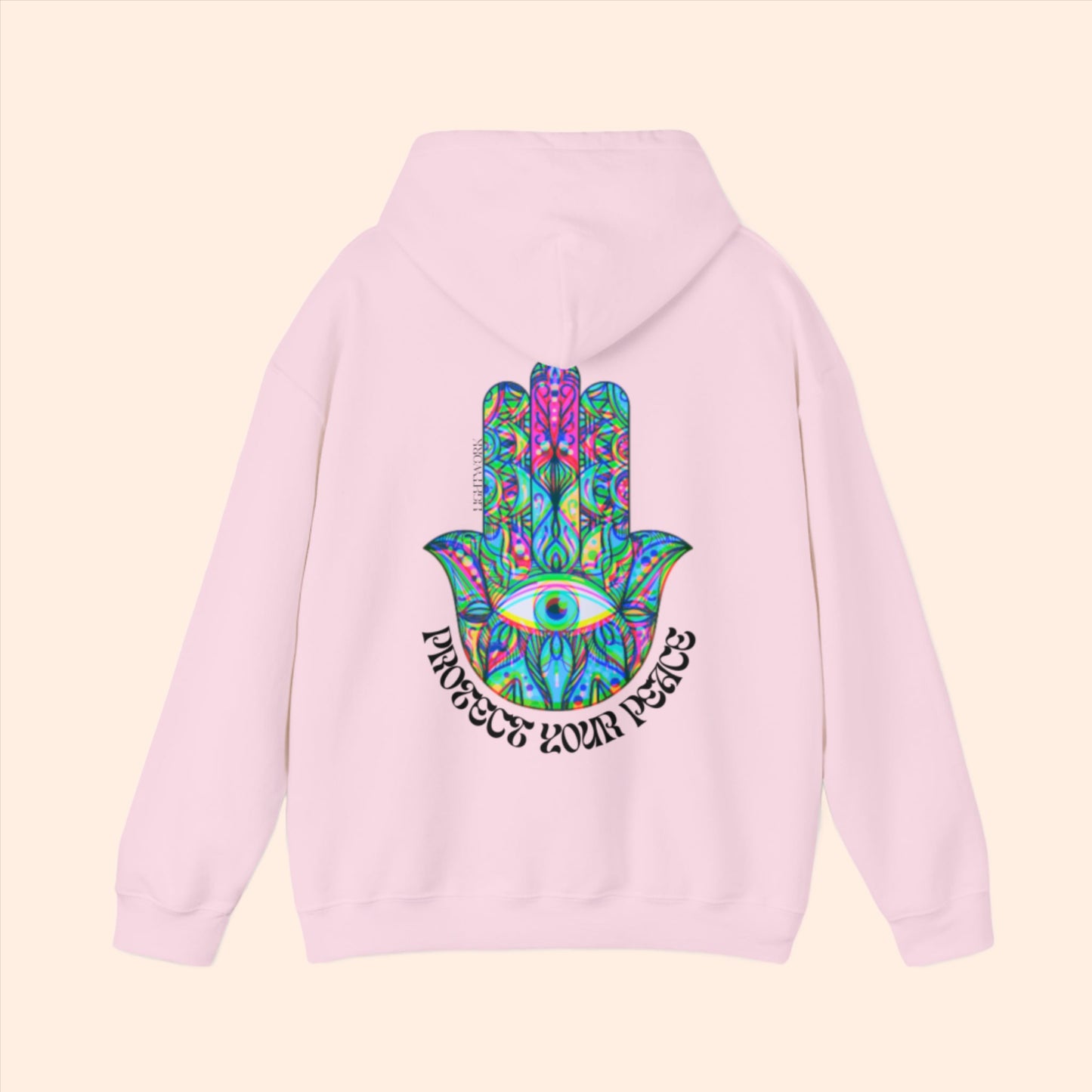 Pink spiritual hoodie. Psychedelic hamsa graphic with "protect your peace" text.