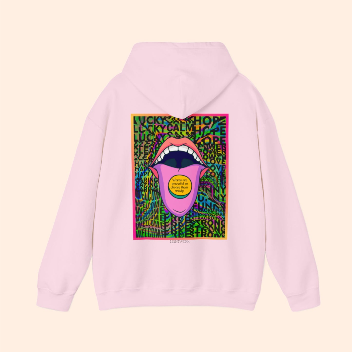 Pink spiritual hoodie. Psychedelic mouth graphic with text "words are powerful so choose them wisely" placed on tongue.
