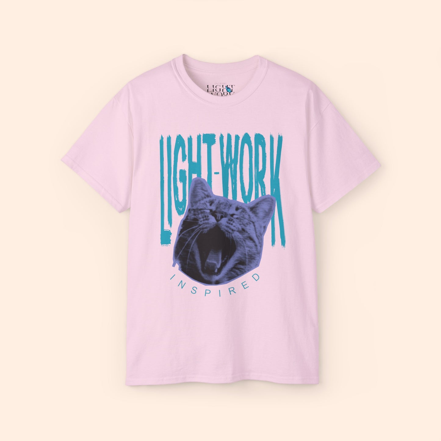 Light pink t-shirt with light blue LIGHT-WORK behind a purple cat graphic.